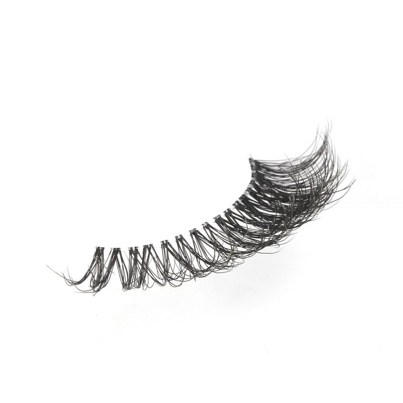up close image of hayati lashes natural and fluffy cat eye lash with an invisible band 